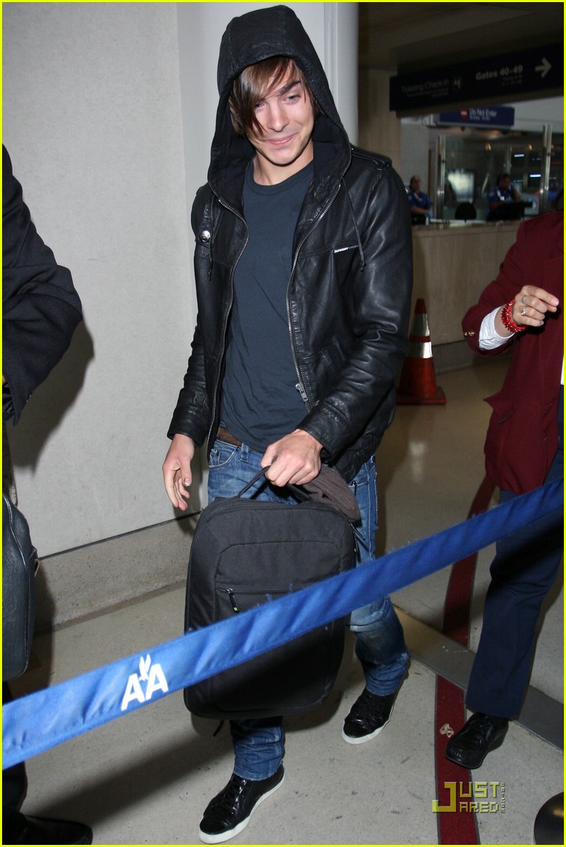 Zac Efron's Luggage Takes A Spill