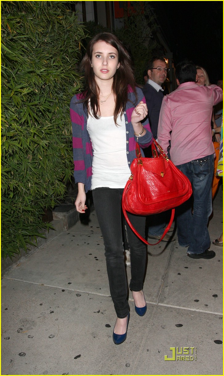 Emma Roberts Gets Koi Kisses