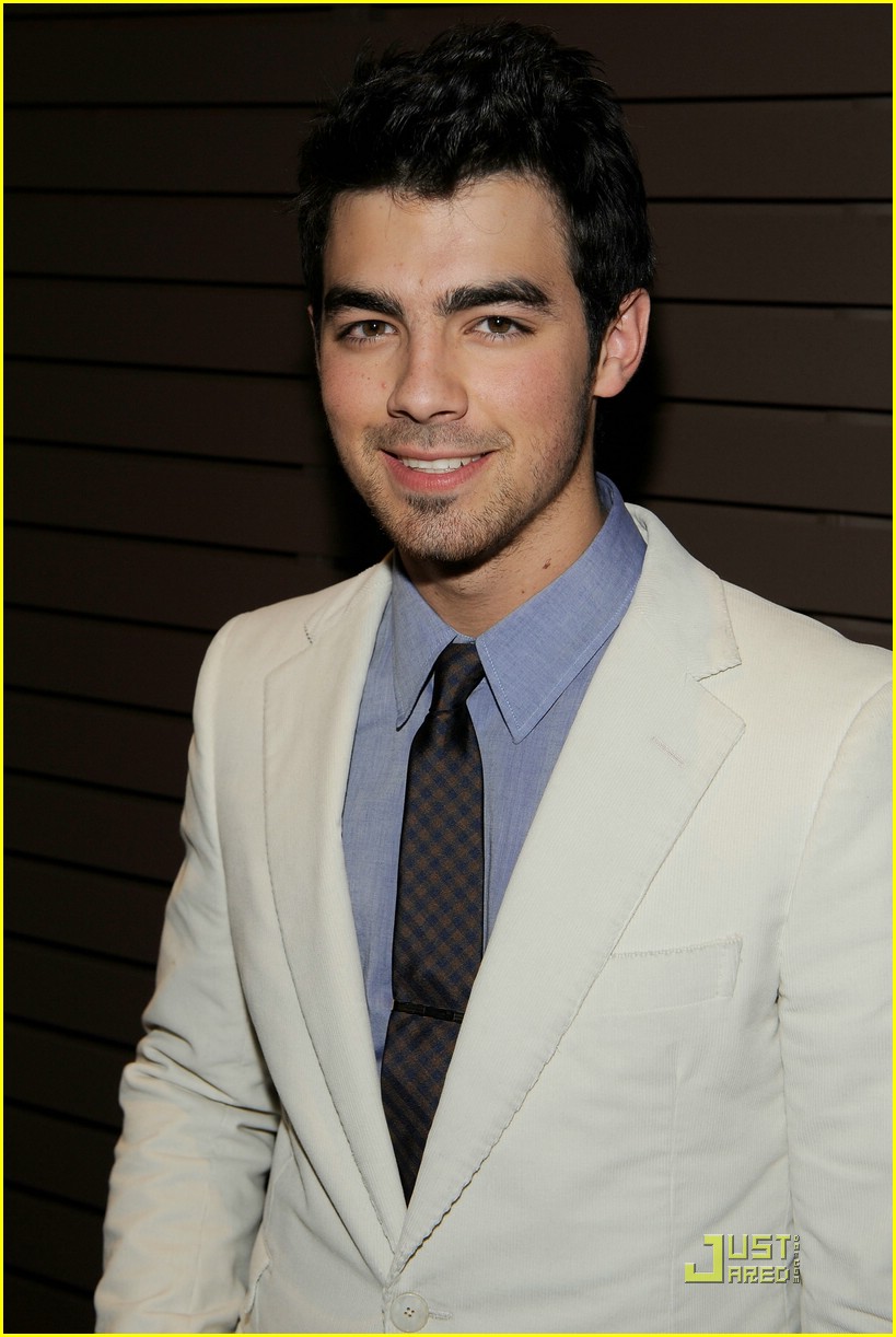 Joe Jonas Hugs Taylor Swift at Grammy Party