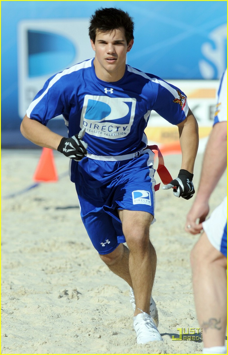 Taylor Lautner: Face To Sand Football Catch!