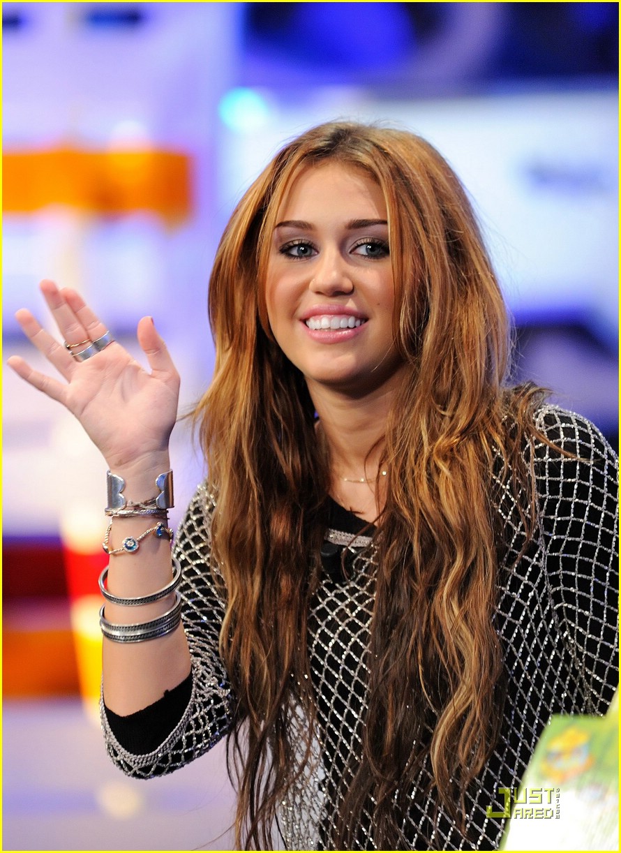 Miley Cyrus is Thigh High Boot Beautiful