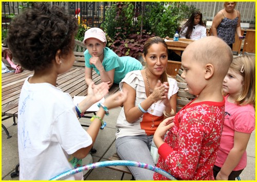Adrienne Bailon Hula Hoops at Ronald McDonald House
