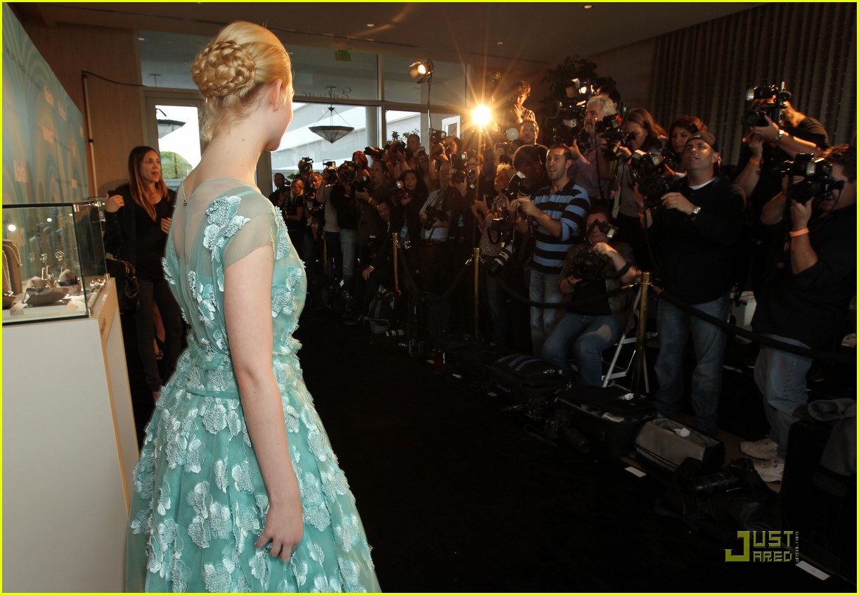 Elle Fanning Gets Hugs From Katie Holmes
