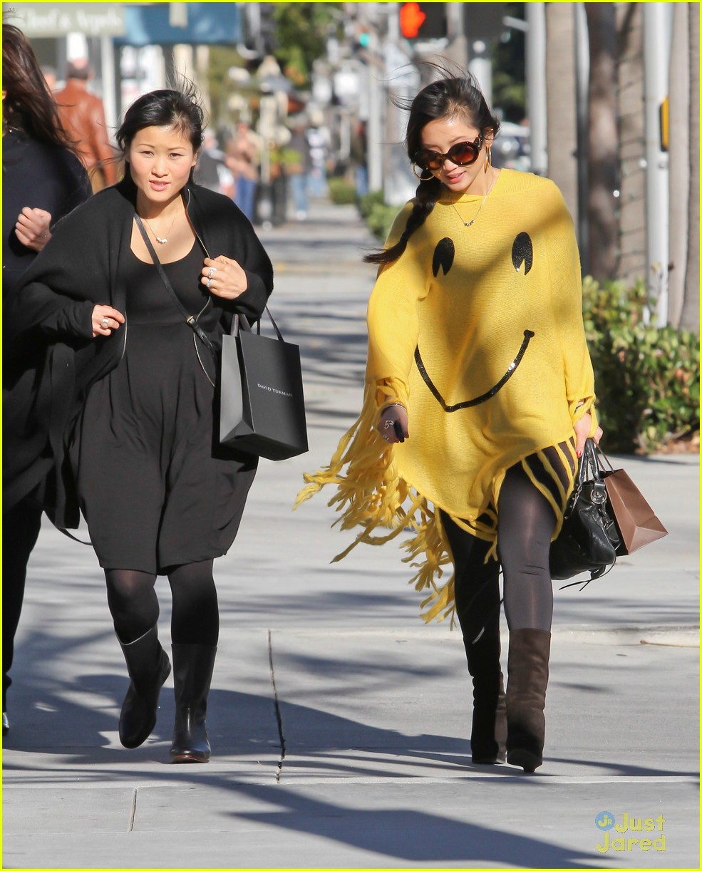 Brenda Song: Smiley Face Shopper