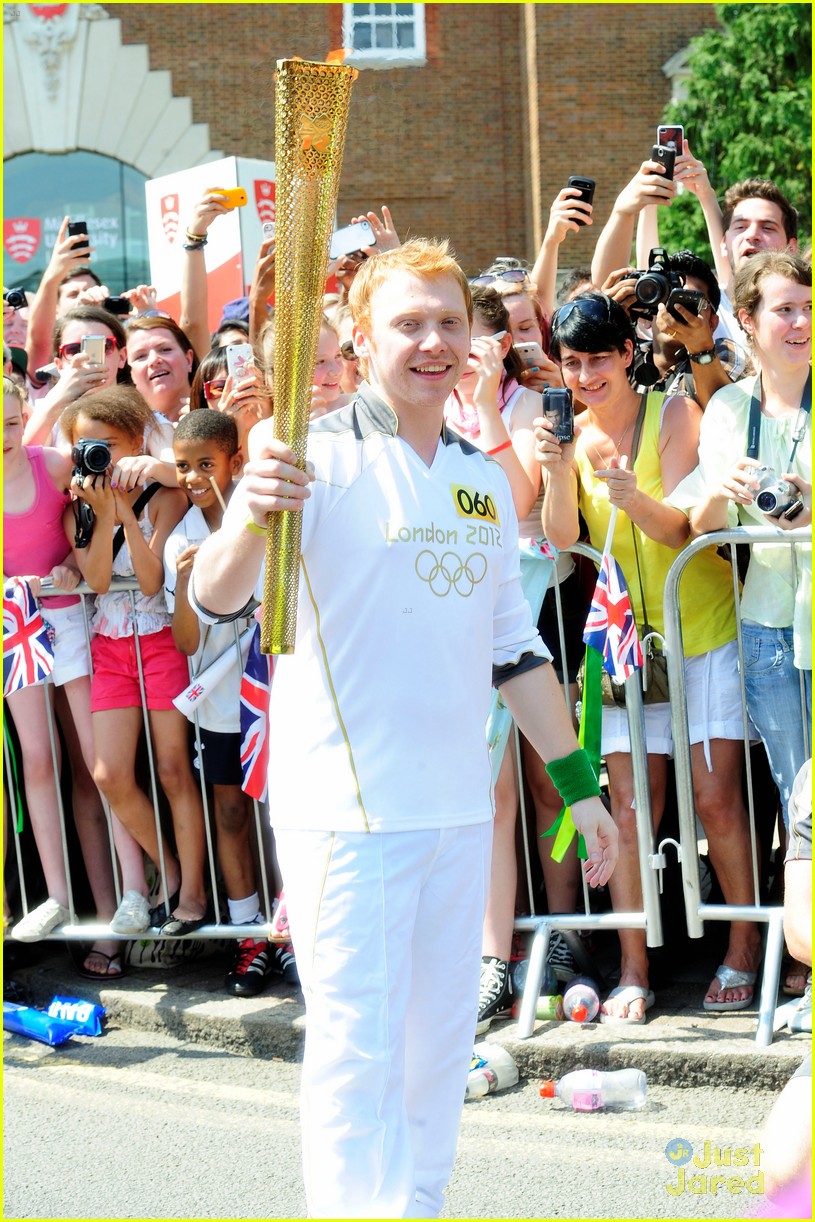 Rupert Grint Runs With Olympics Torch