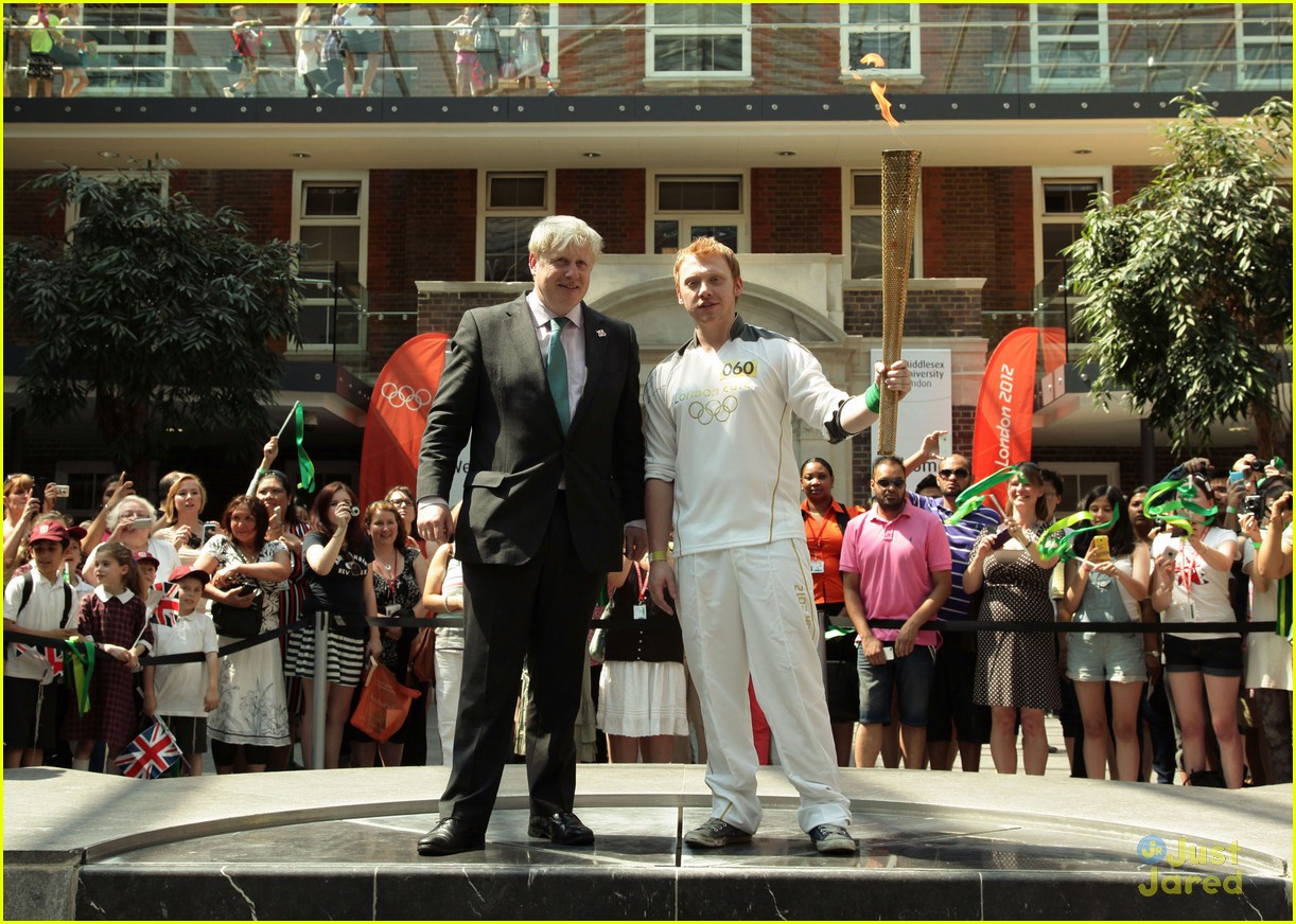 Rupert Grint Runs With Olympics Torch