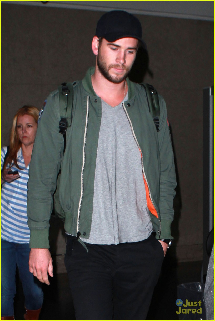 Liam Hemsworth Arrives at LAX Airport