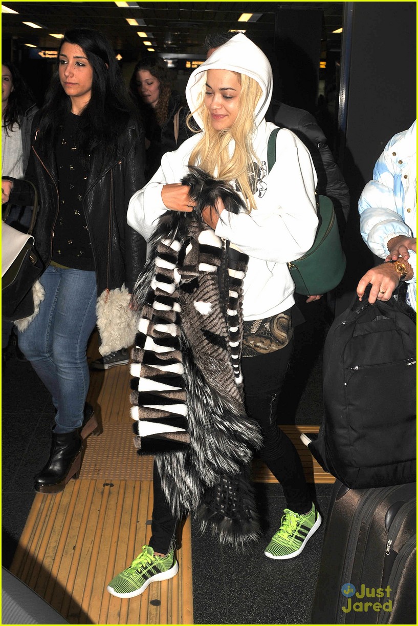 Rita Ora Arrives For Milan Fashion Week After BRIT Awards