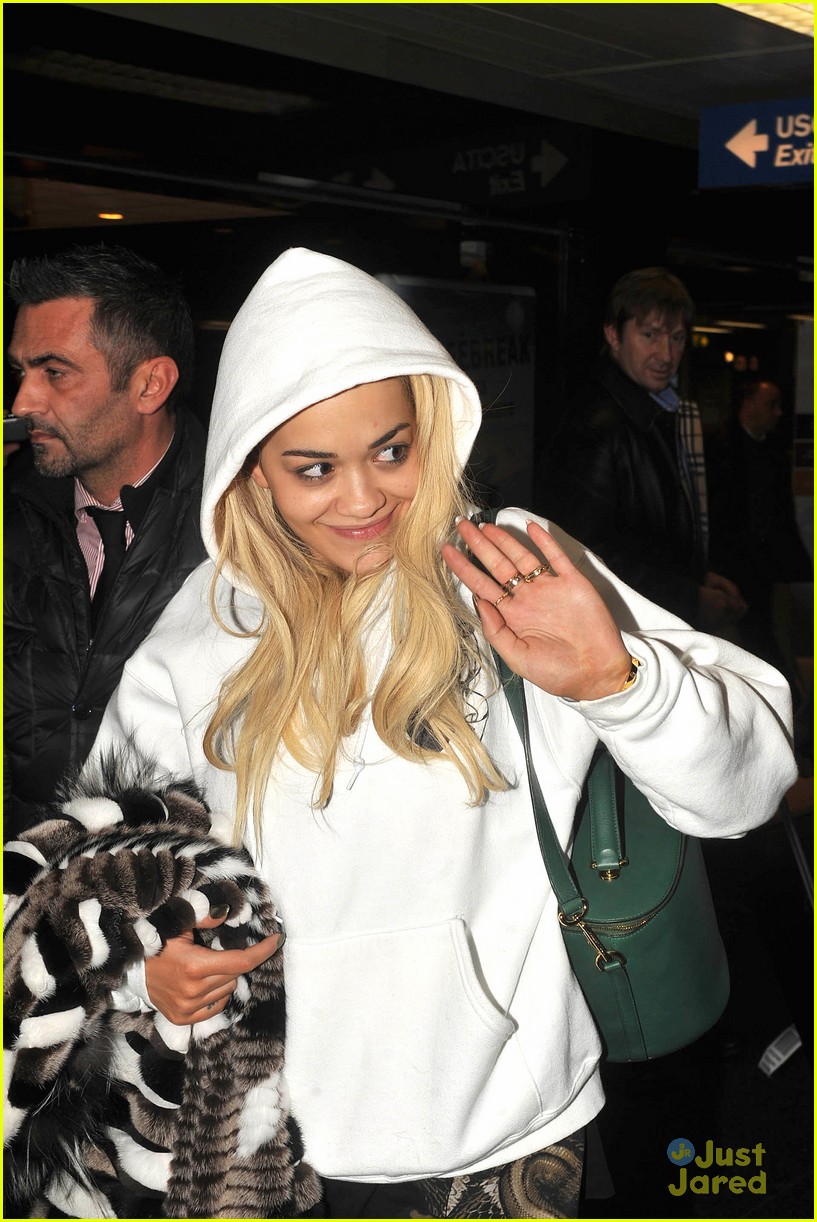 Rita Ora Arrives For Milan Fashion Week After BRIT Awards