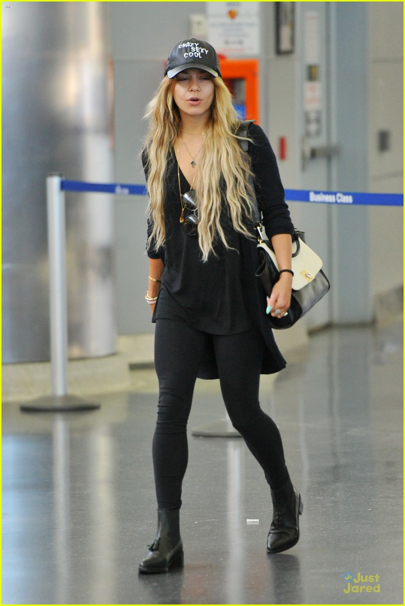 Vanessa Hudgens Keeps It Red at LAX Airport!