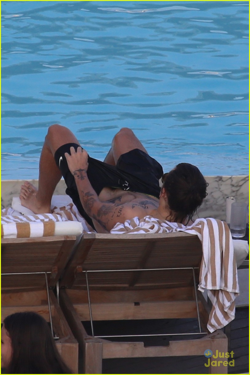 Harry Styles Goes Shirtless Again in Rio!