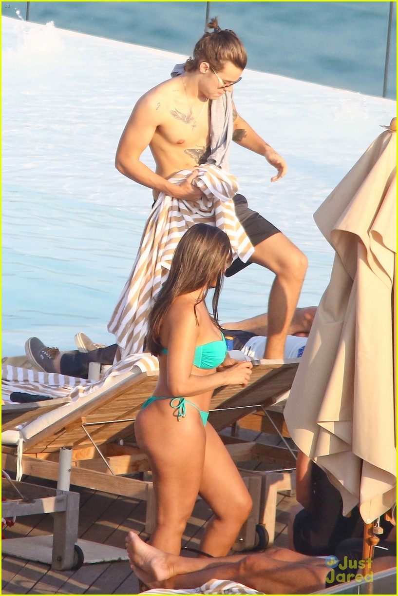 Harry Styles Goes Shirtless Again in Rio!