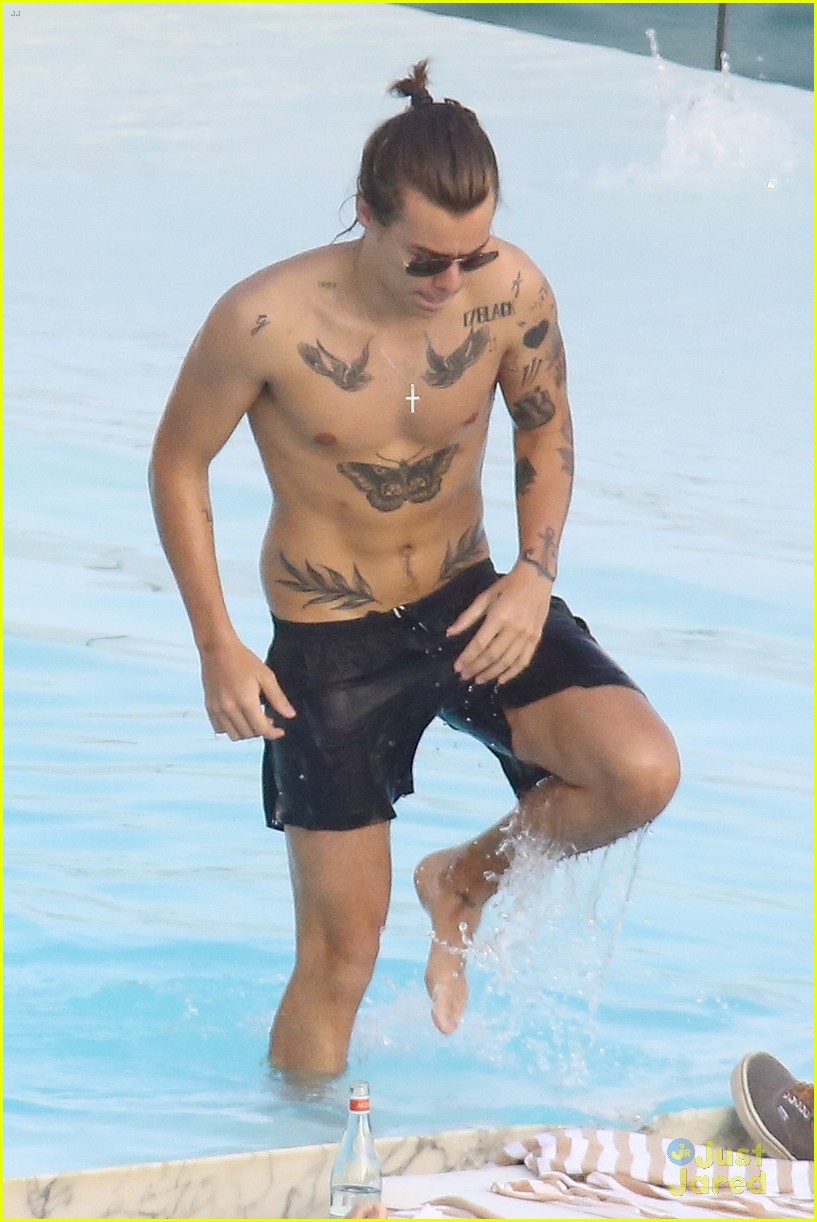 Harry Styles Goes Shirtless Again in Rio!