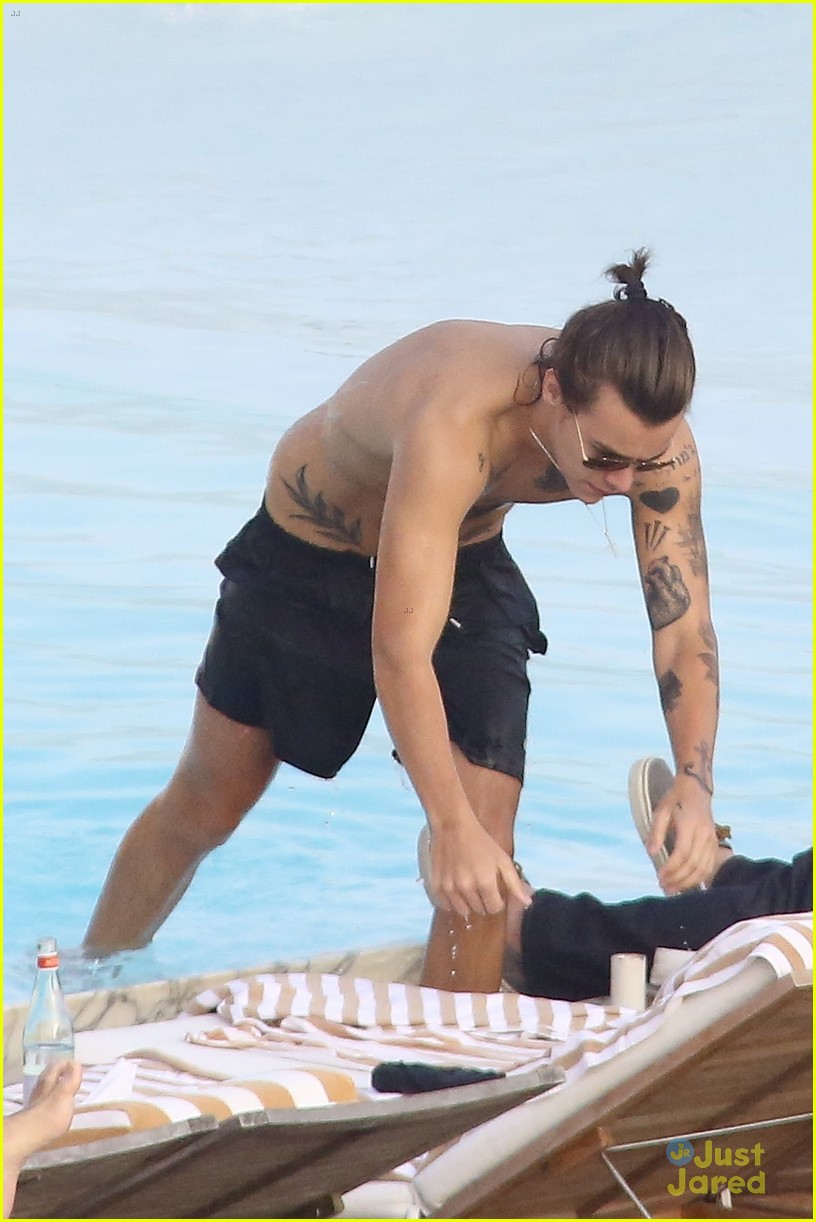 Harry Styles Goes Shirtless Again in Rio!