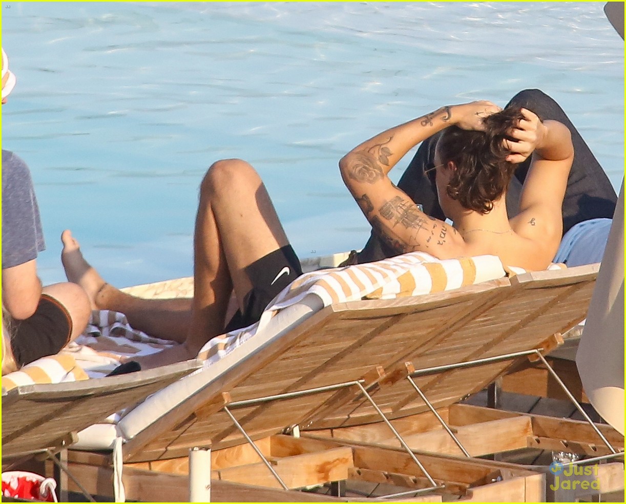 Harry Styles Goes Shirtless Again in Rio!