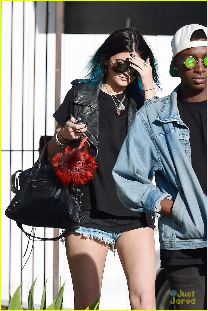Kendall Jenner Arrives in Cannes, While Kylie Touches Up Her Blue Hair