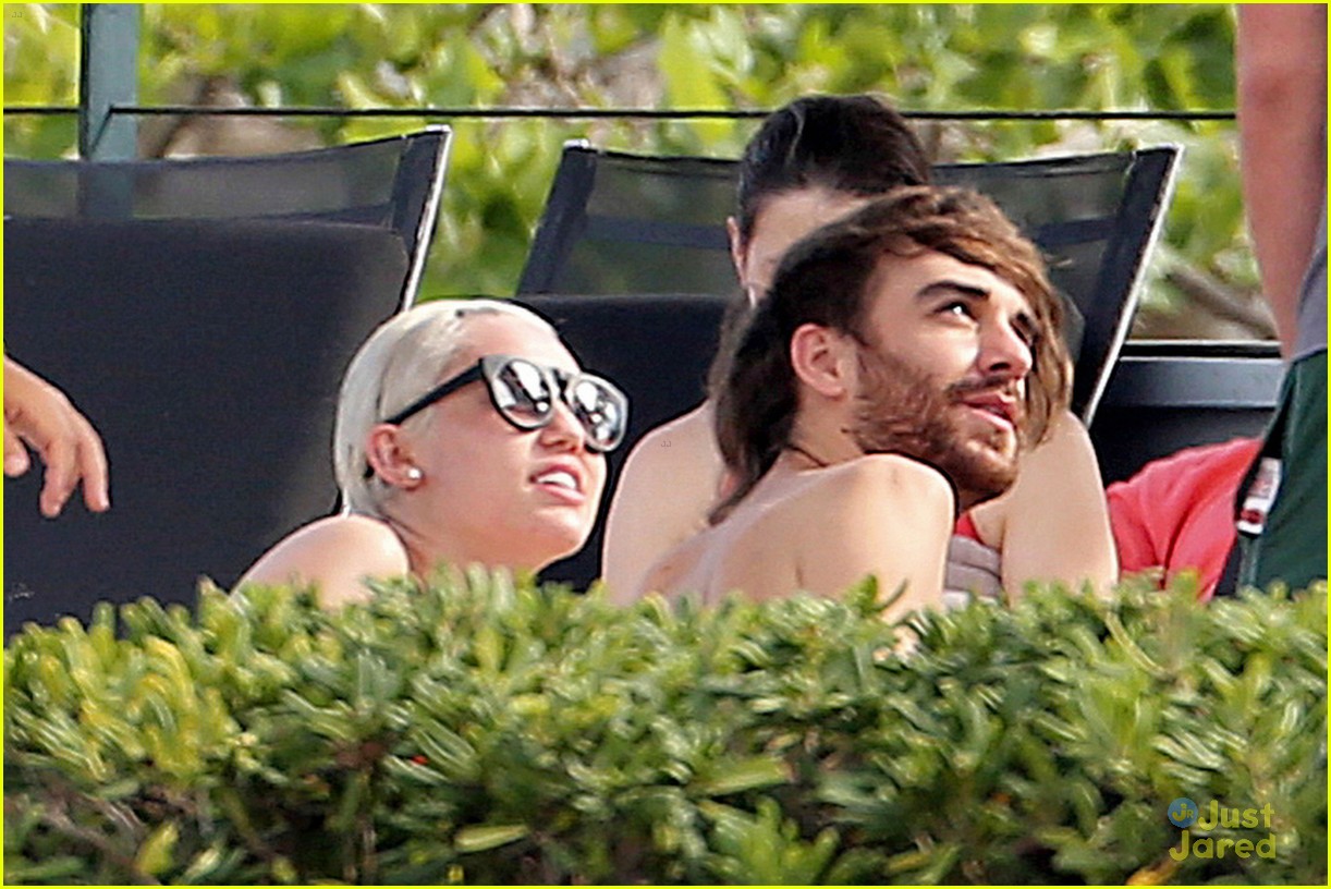 Miley Cyrus Flaunts Her Bikini Body Poolside in Barcelona!