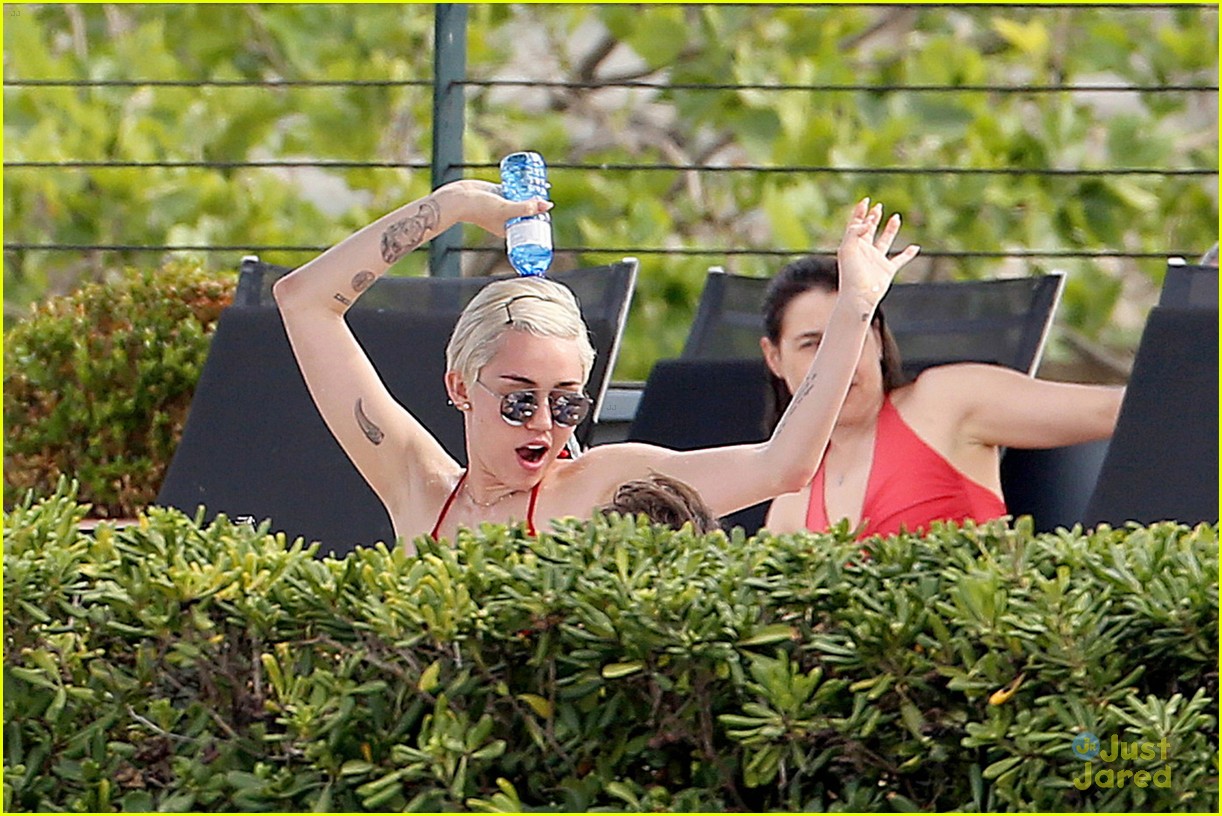 Miley Cyrus Flaunts Her Bikini Body Poolside in Barcelona!
