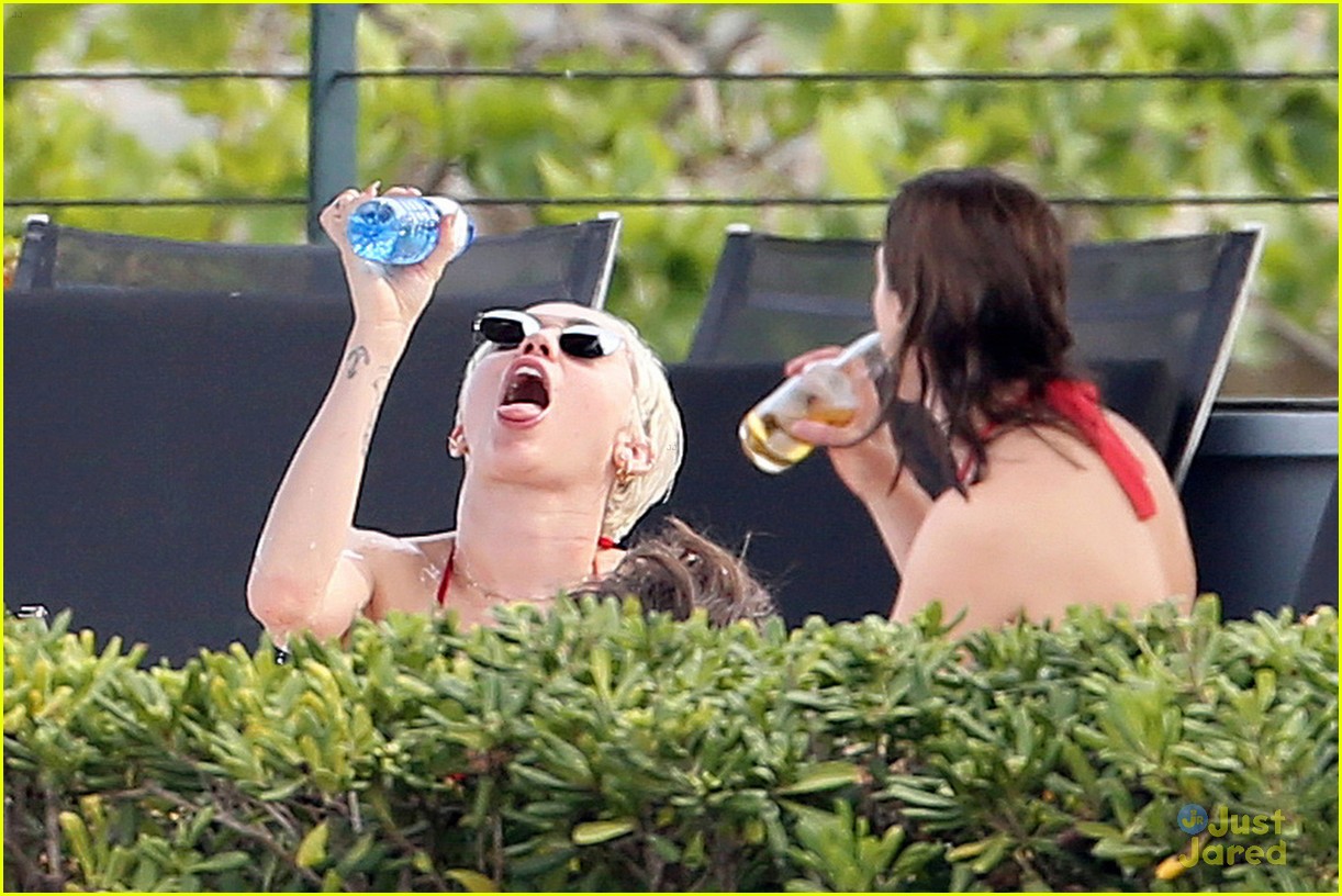 Miley Cyrus Flaunts Her Bikini Body Poolside in Barcelona!