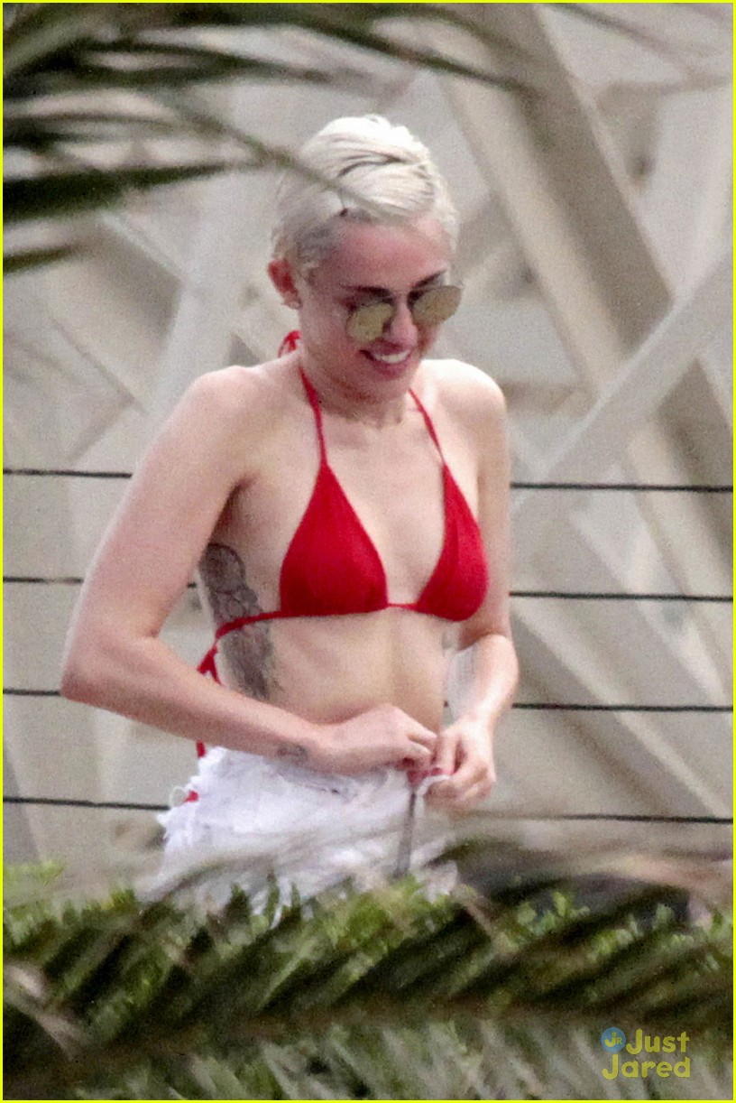 Miley Cyrus Flaunts Her Bikini Body Poolside in Barcelona!