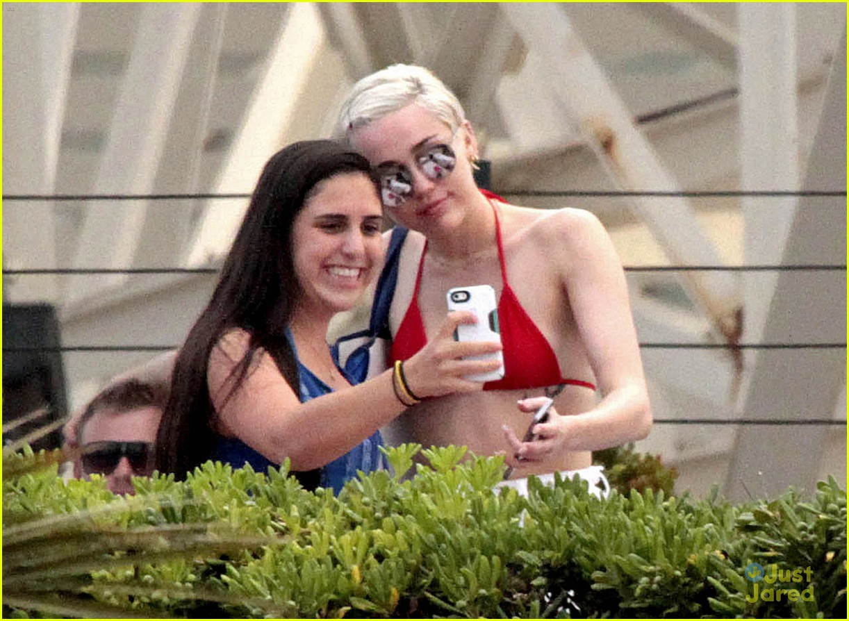 Miley Cyrus Flaunts Her Bikini Body Poolside in Barcelona!