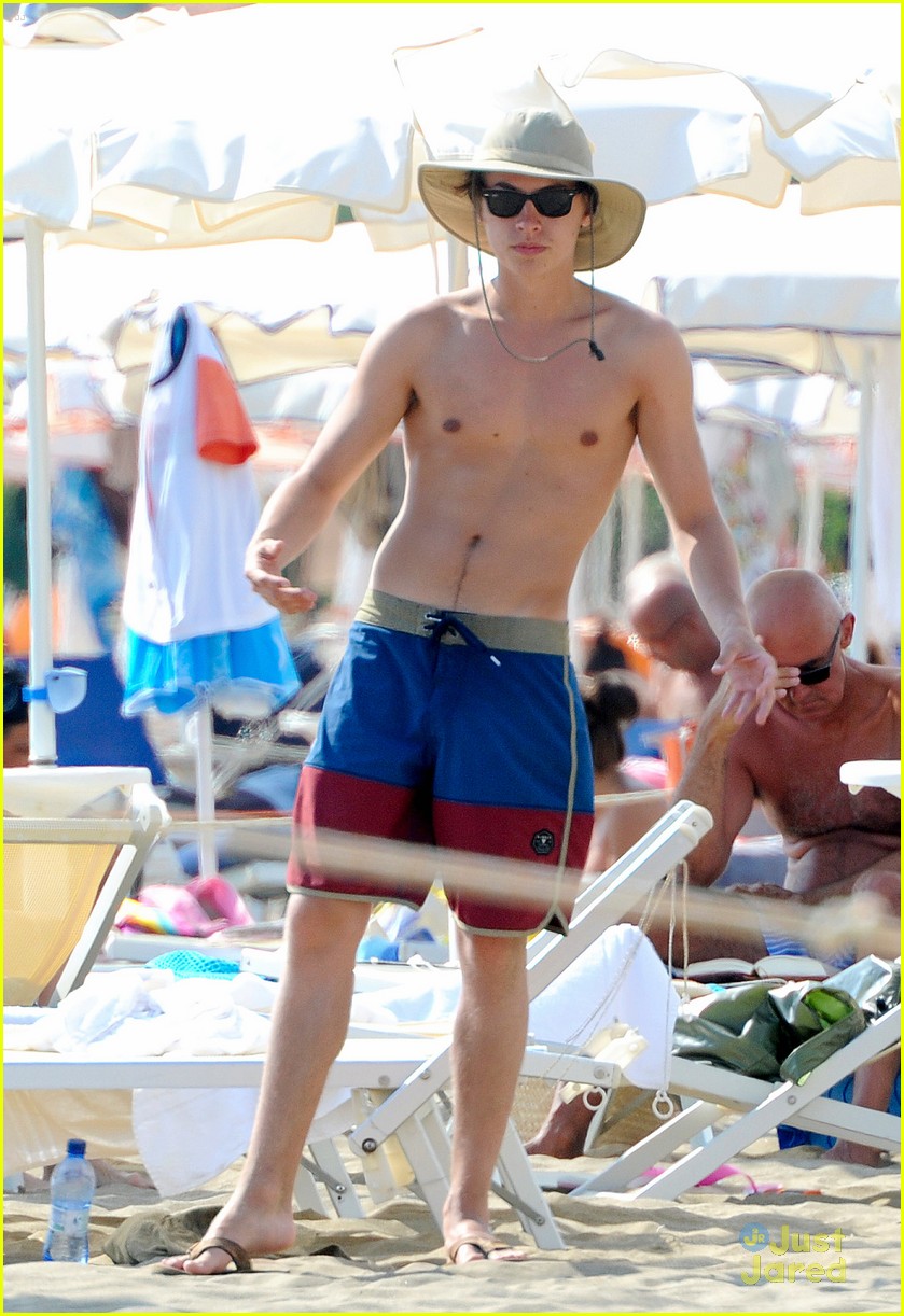 Cole & Dylan Sprouse Hit The Beach During Italian Vacation