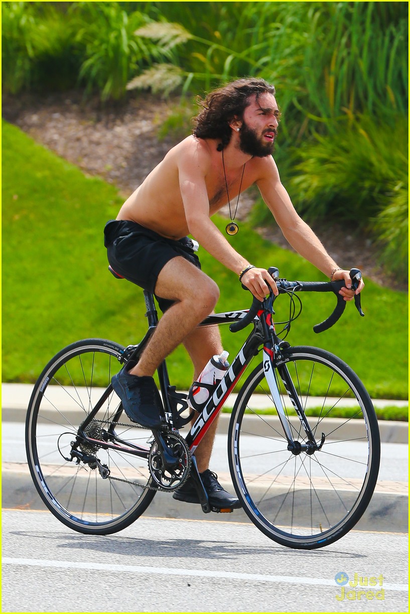 Mateo Arias Takes a Shirtless Bike Ride with a Full Beard & Long Hair