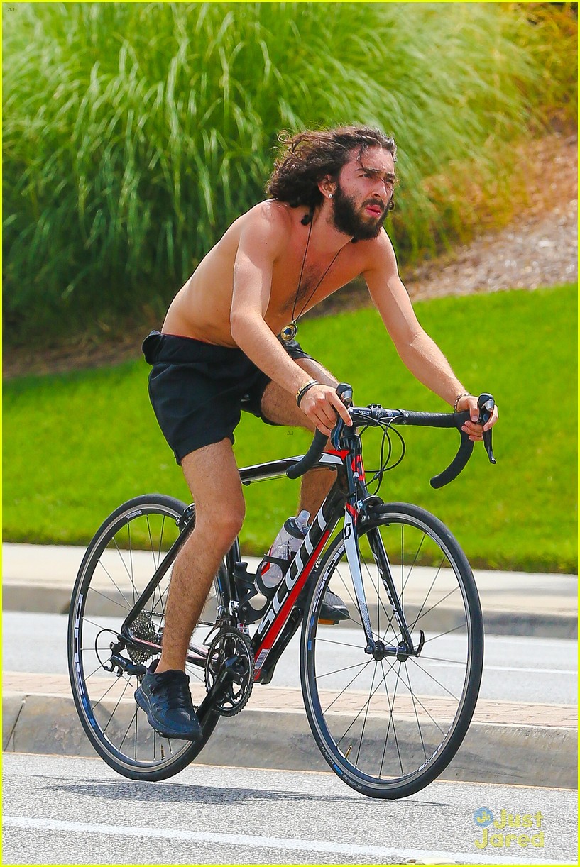 Mateo Arias Takes a Shirtless Bike Ride with a Full Beard & Long Hair