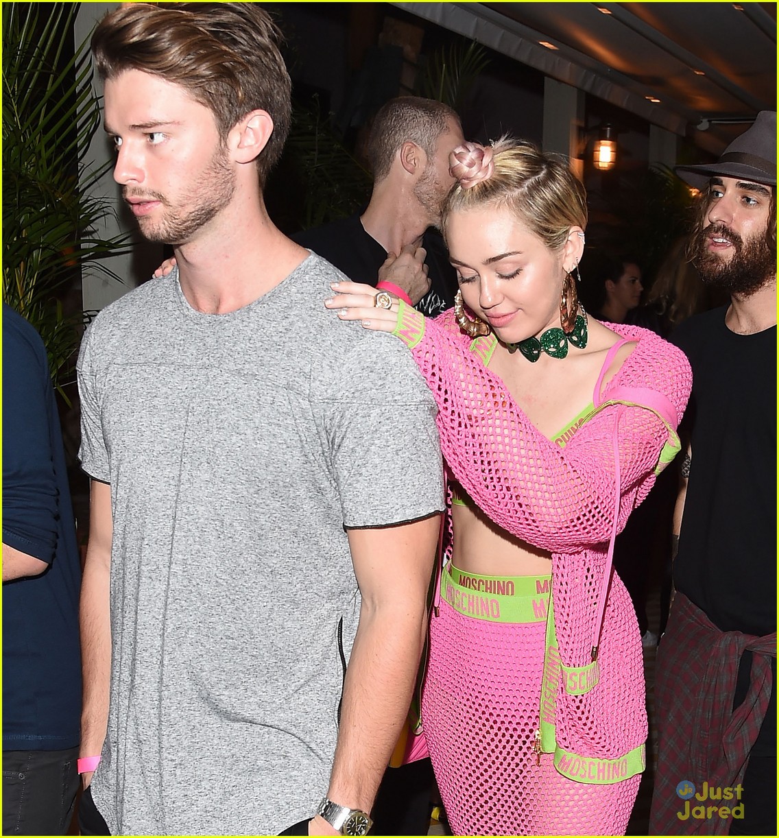 Miley Cyrus & Patrick Schwarzenegger Keep Close at Miami Party