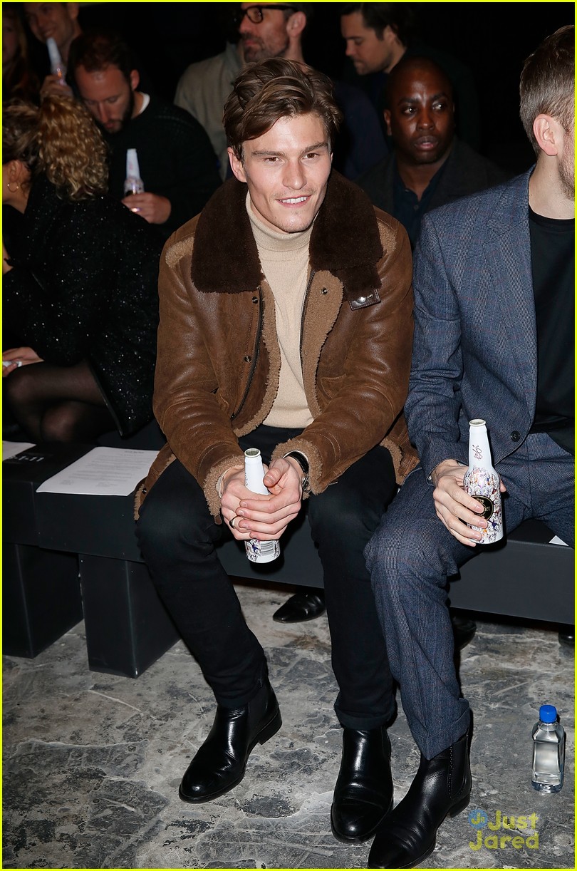 Oliver Cheshire Brings Pixie Lott To Moschino Show During London Collections