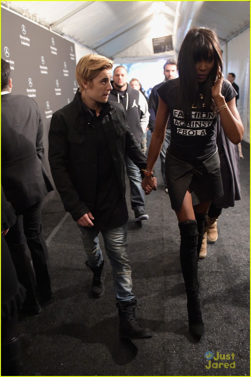 Justin Bieber & Naomi Campbell Walk Hand-in-Hand at Her Charity Fashion Show