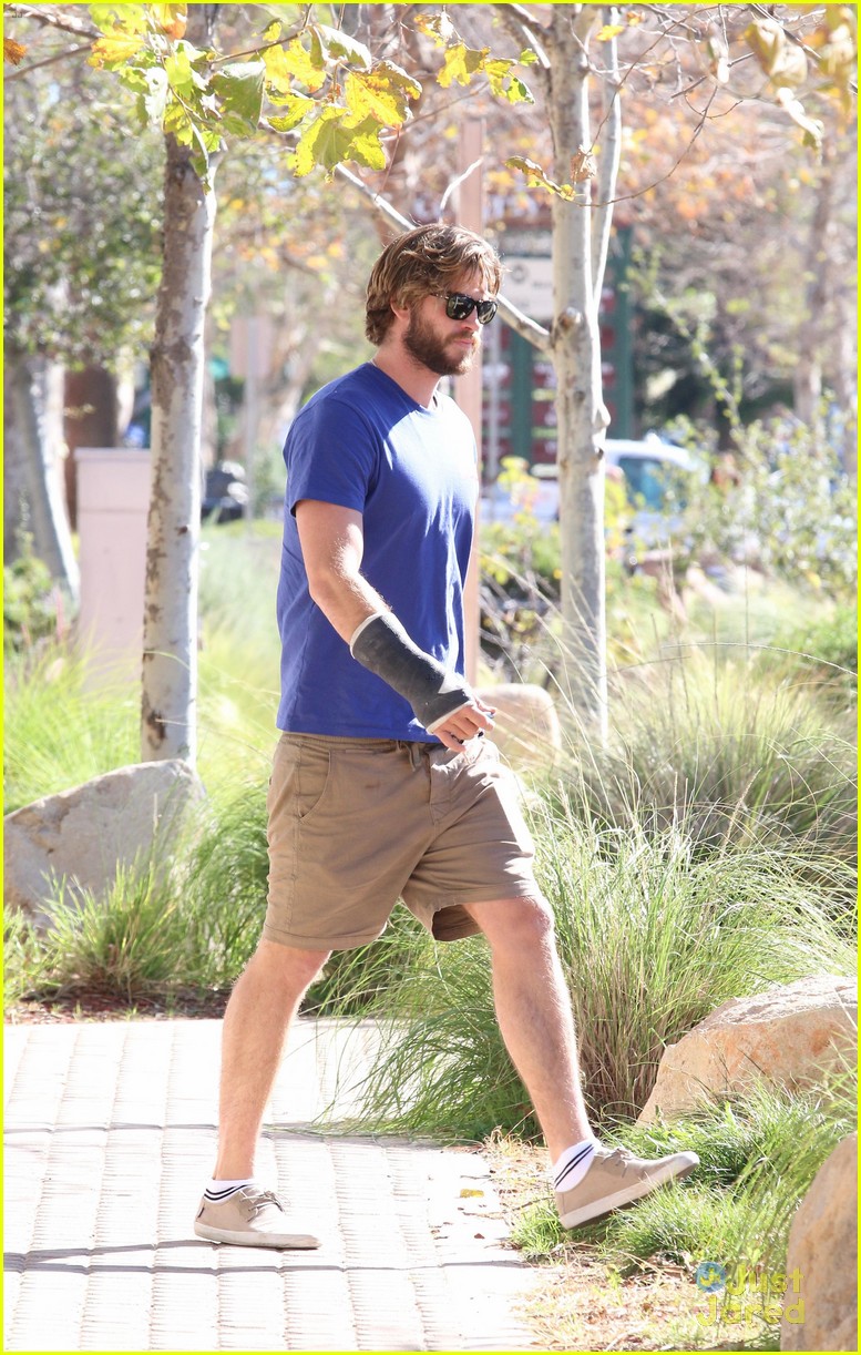 Liam Hemsworth Continues to Sport Cast Right Before Valentine's Day