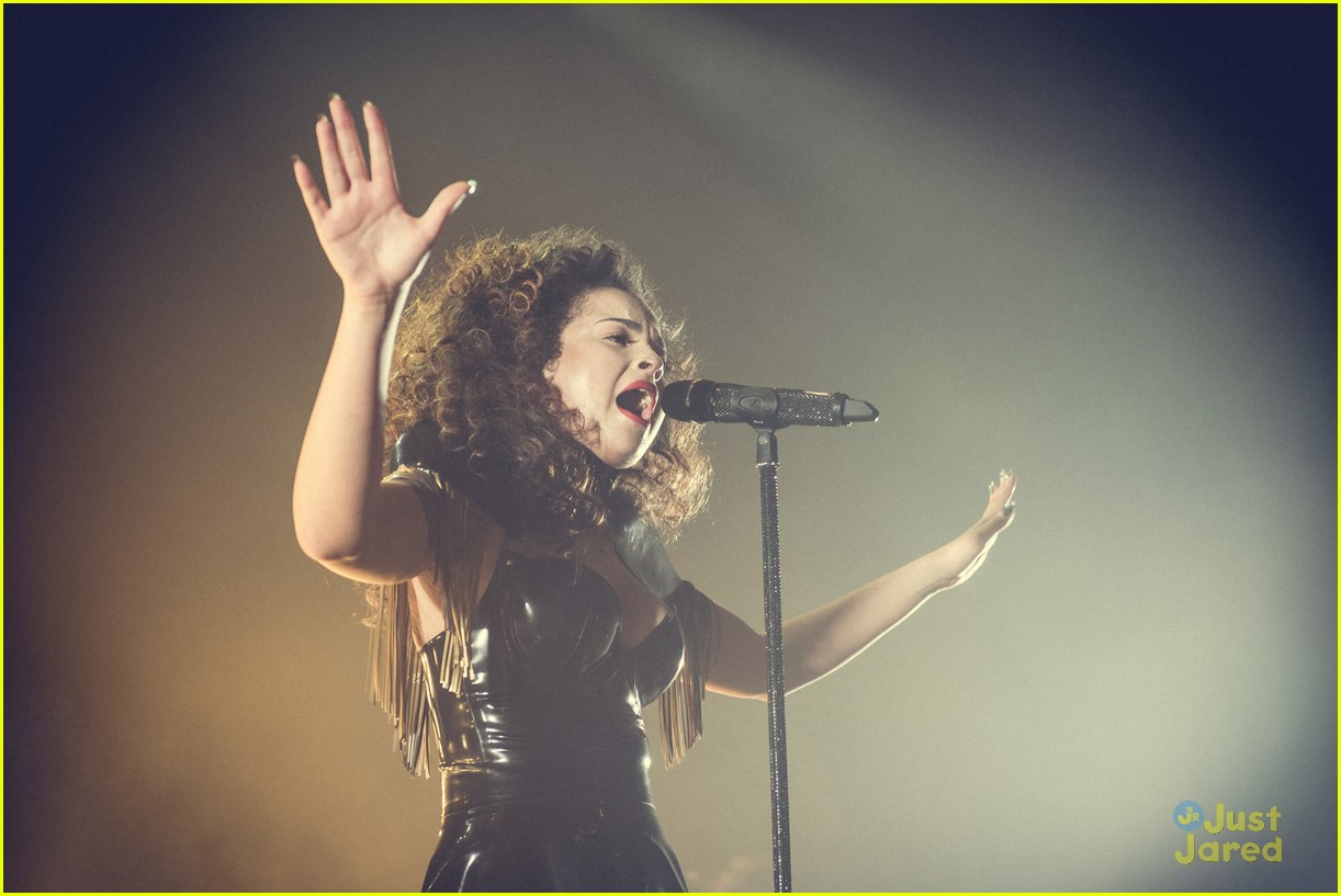 Ella Eyre Wears Fringed Cape & Winged Sneakers For Roundhouse Concert