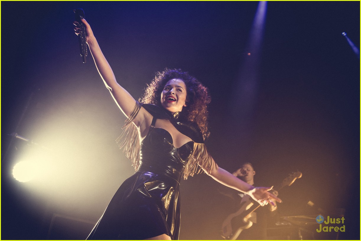 Ella Eyre Wears Fringed Cape & Winged Sneakers For Roundhouse Concert