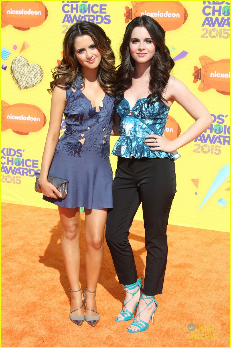 Calum Worthy Remembers To Wear His Earth Hour Shirt To KCAs 2015 with Laura Marano