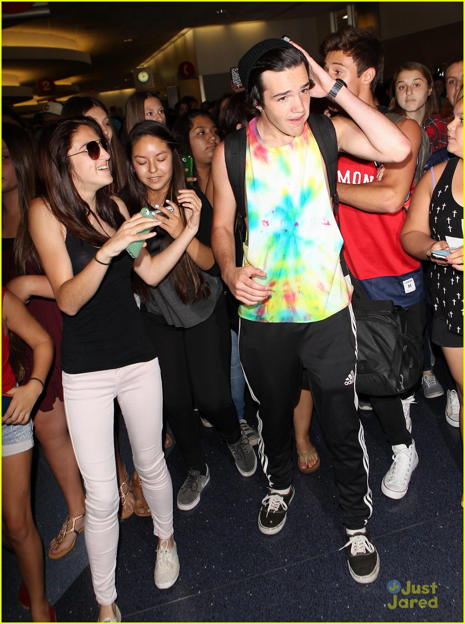 Cameron Dallas & Aaron Carpenter Surrounded By Welcoming Fans At LAX