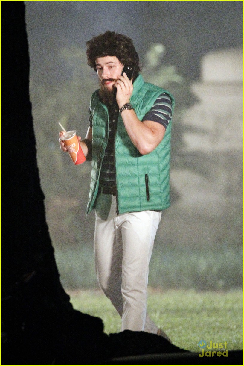 Nick Jonas Wears Curly Hair Wig On 'Scream Queens' Set