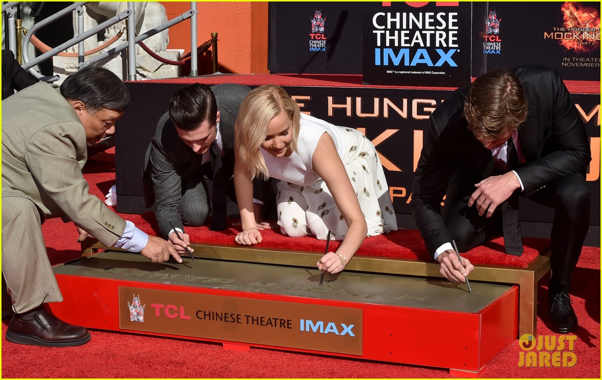 Jennifer Lawrence & Josh Hutcherson Put Their Mark On Hollywood For 'The Hunger Games'