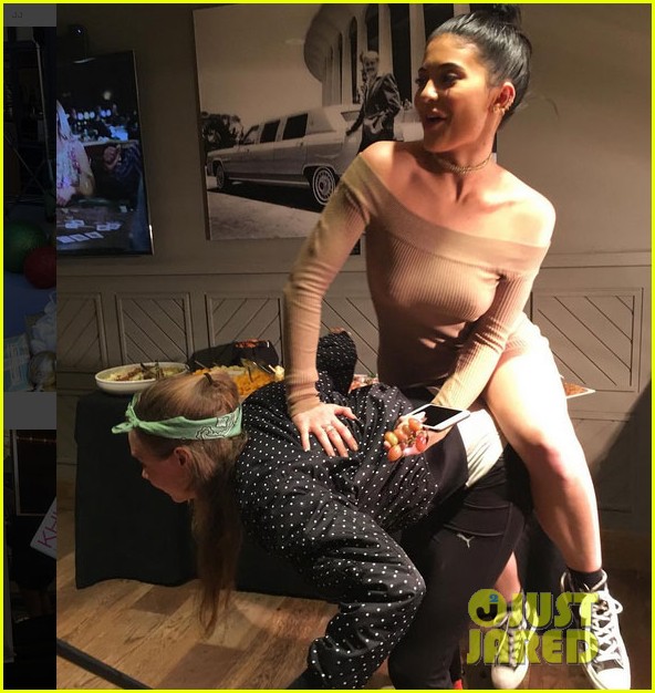 Kylie Jenner Gives Kendall & Cara Delevingne Piggyback Rides at The Weeknd Concert