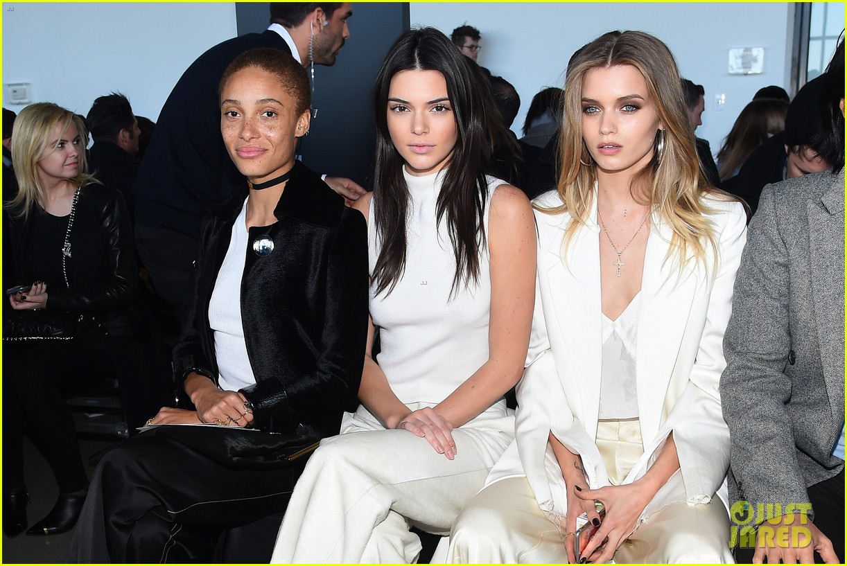 Kendall Jenner Bares Midriff While Attending Calvin Klein Show
