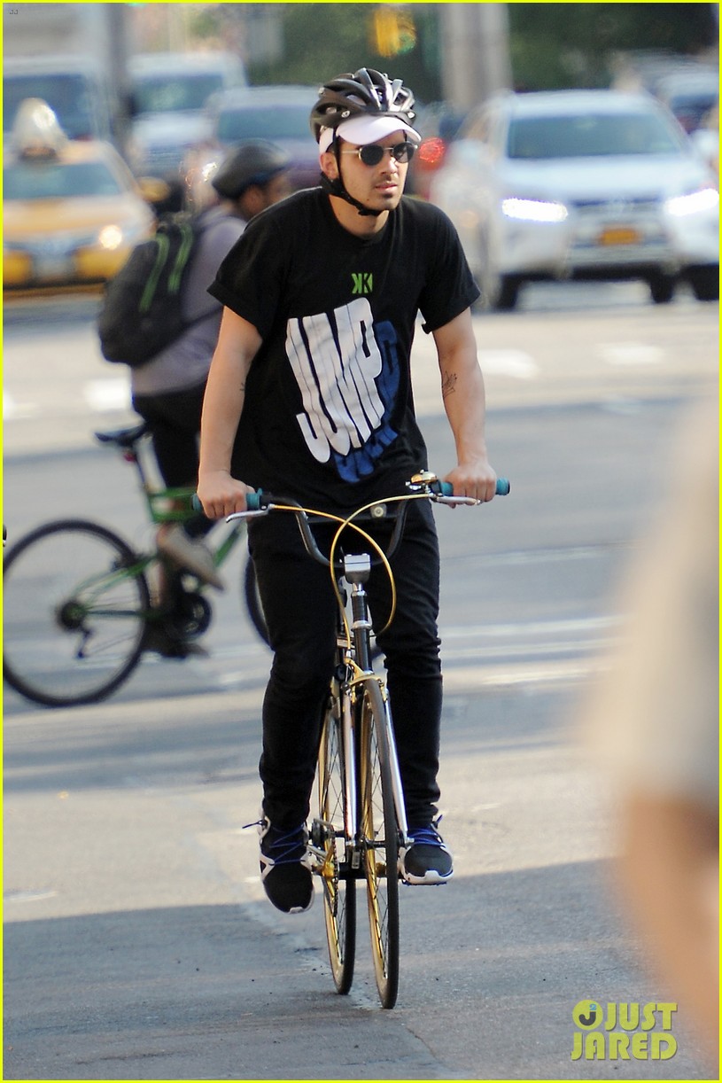 Joe Jonas & Model Eileen Kelly Cycle City Streets Together