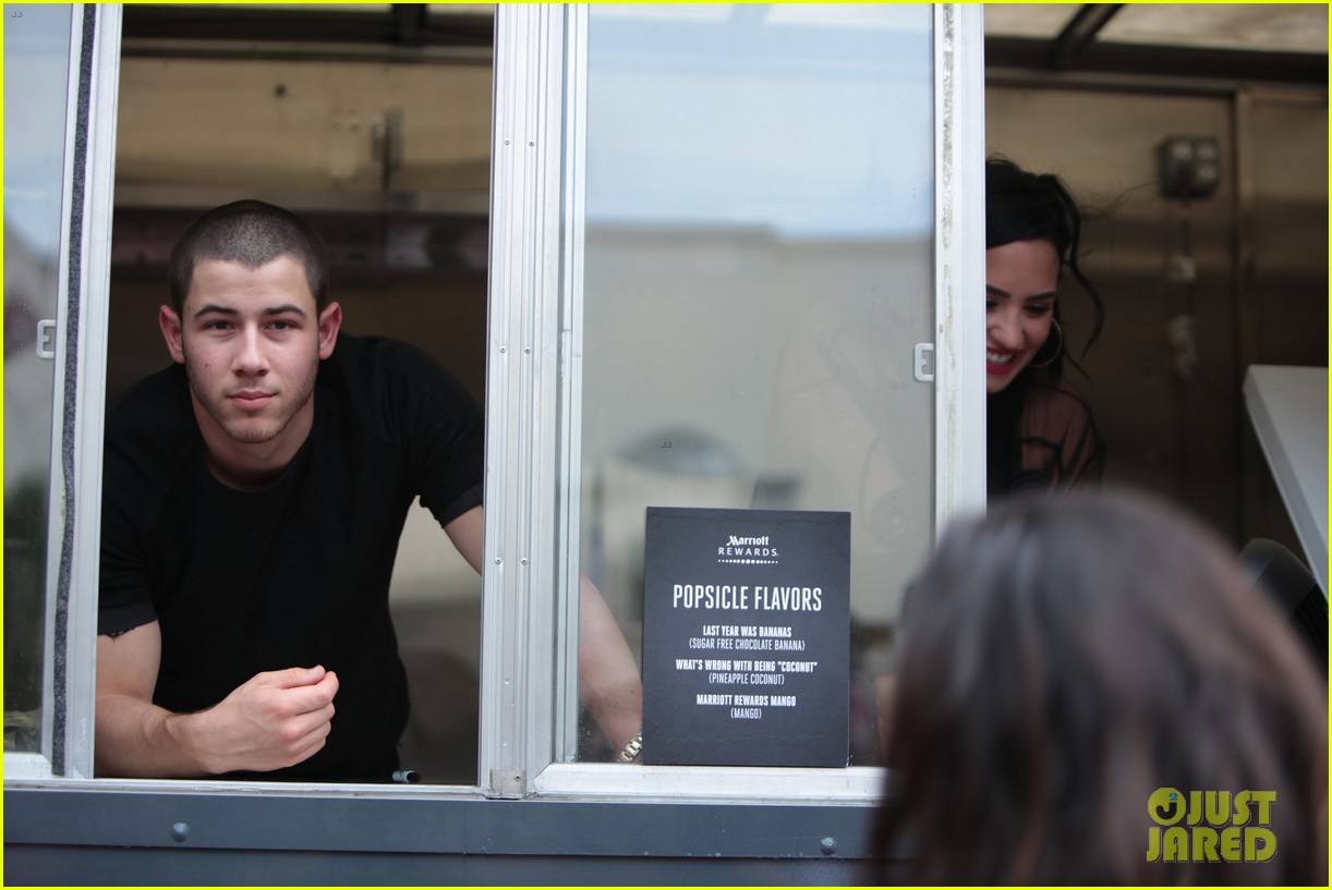 Demi Lovato & Nick Jonas Hand Out Free Treats in Atlanta