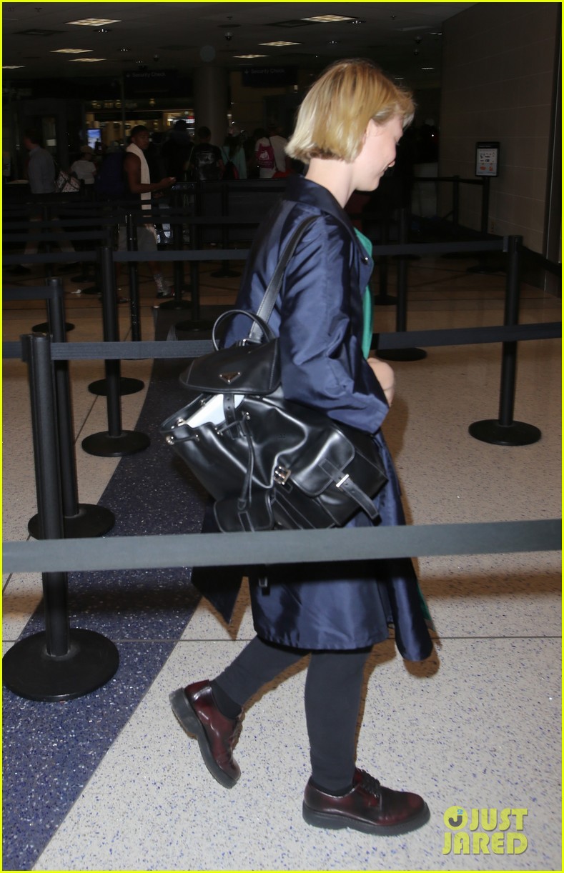 Mia Wasikowska Catches a Flight Out of LAX Airport Alongside Robert Pattinson