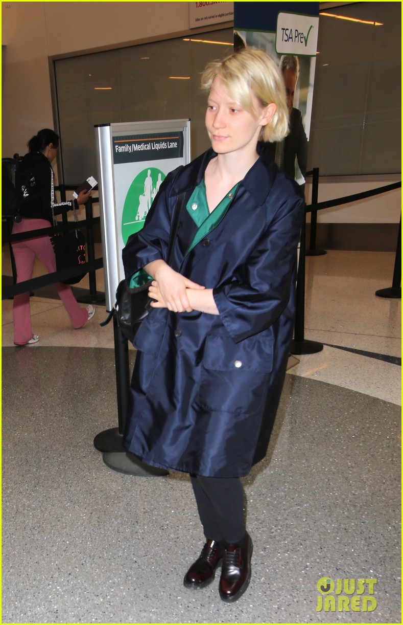 Mia Wasikowska Catches a Flight Out of LAX Airport Alongside Robert Pattinson