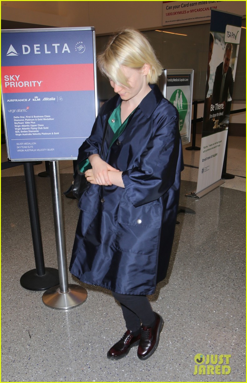 Mia Wasikowska Catches a Flight Out of LAX Airport Alongside Robert Pattinson