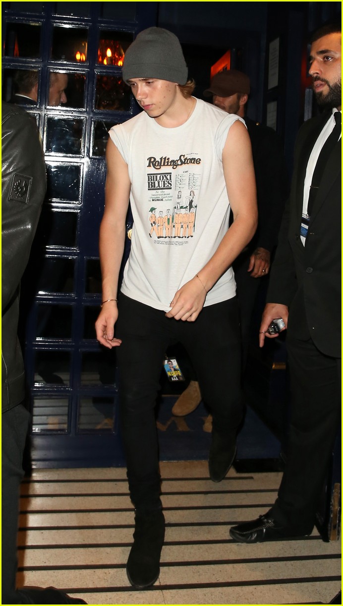 Brooklyn Beckham Joins Dad David at a Concert