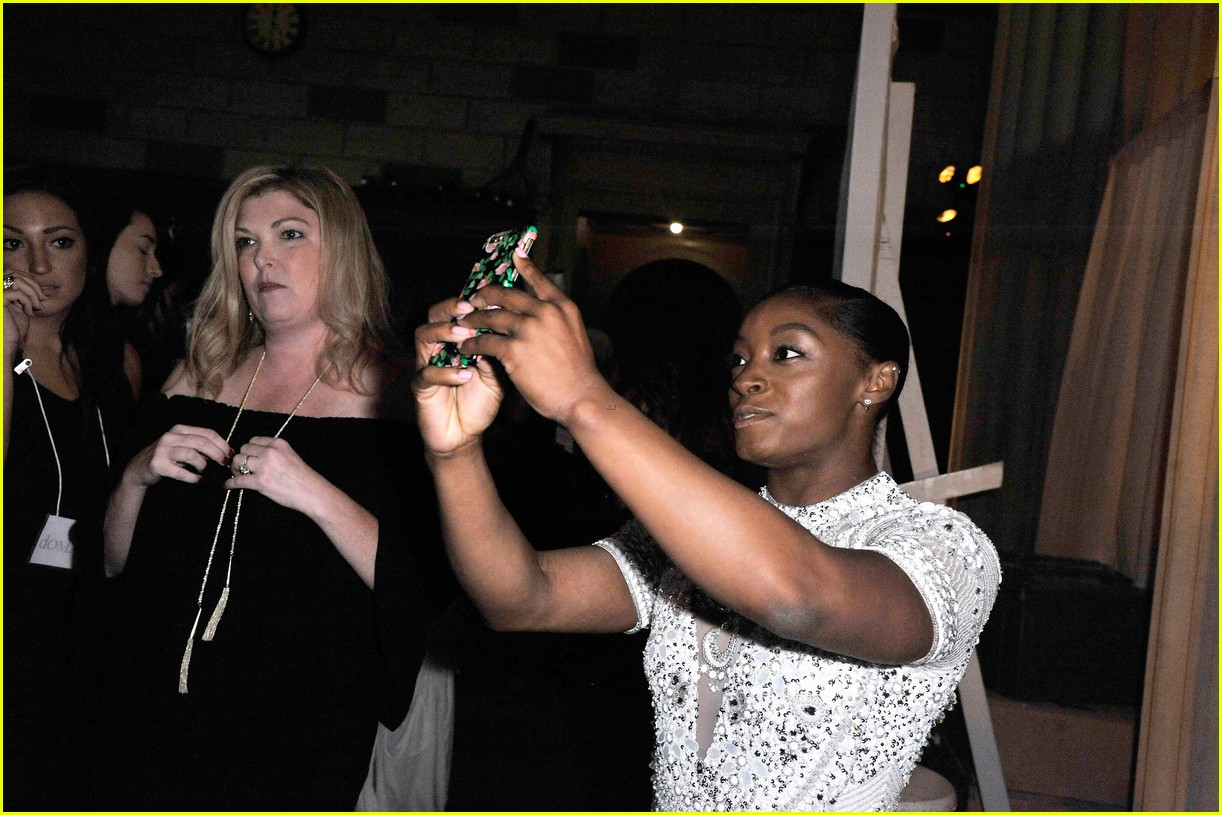 Simone Biles & Aly Raisman Watch Sadie Robertson Walk in Sherri Hill's Fashion Show