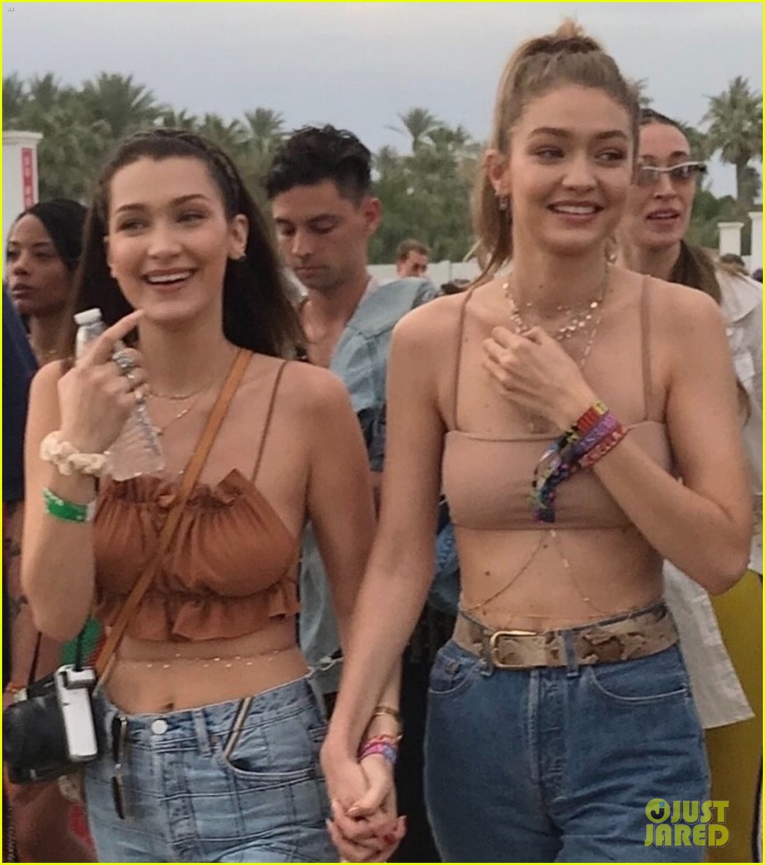 Gigi & Bella Hadid Are Twinning in Crop Tops & Denim at Coachella