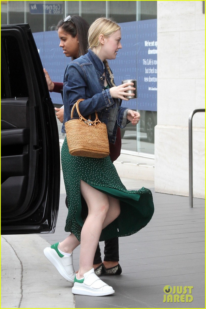 Dakota Fanning Dons Denim Jacket With Green Polka-Dot Dress for Work Meeting
