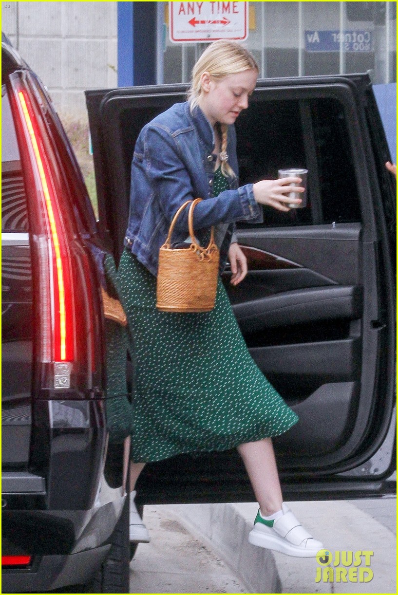 Dakota Fanning Dons Denim Jacket With Green Polka-Dot Dress for Work Meeting